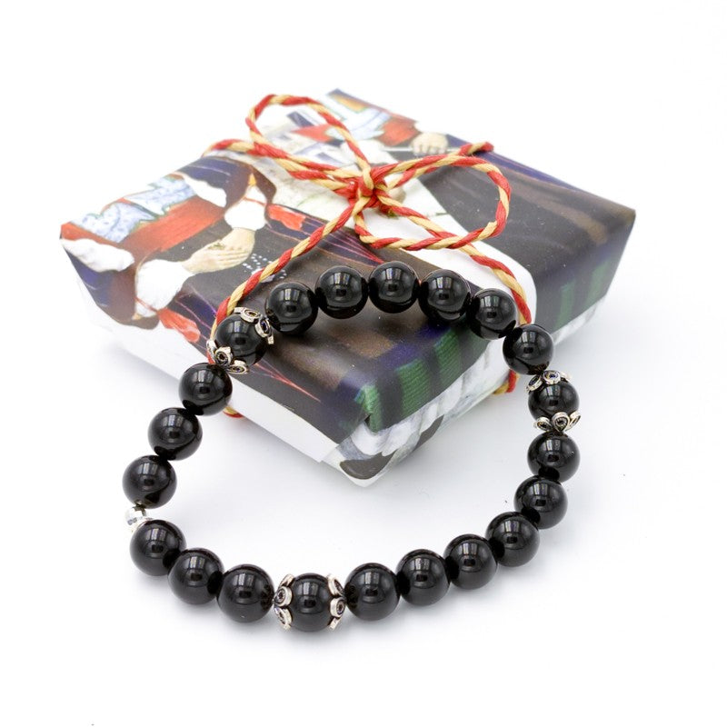 Bracciale sardo in argento con kokkos e more