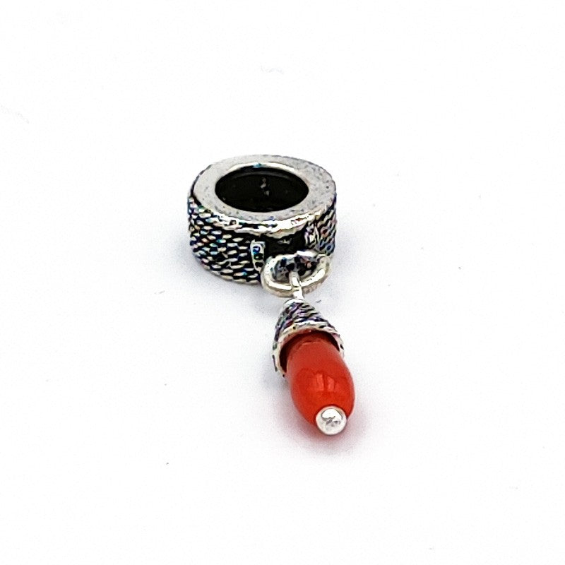 Charm pendente in argento con corallo