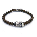 Bracciale elastico con pietra Granato e maschera sarda mamuthones in argento