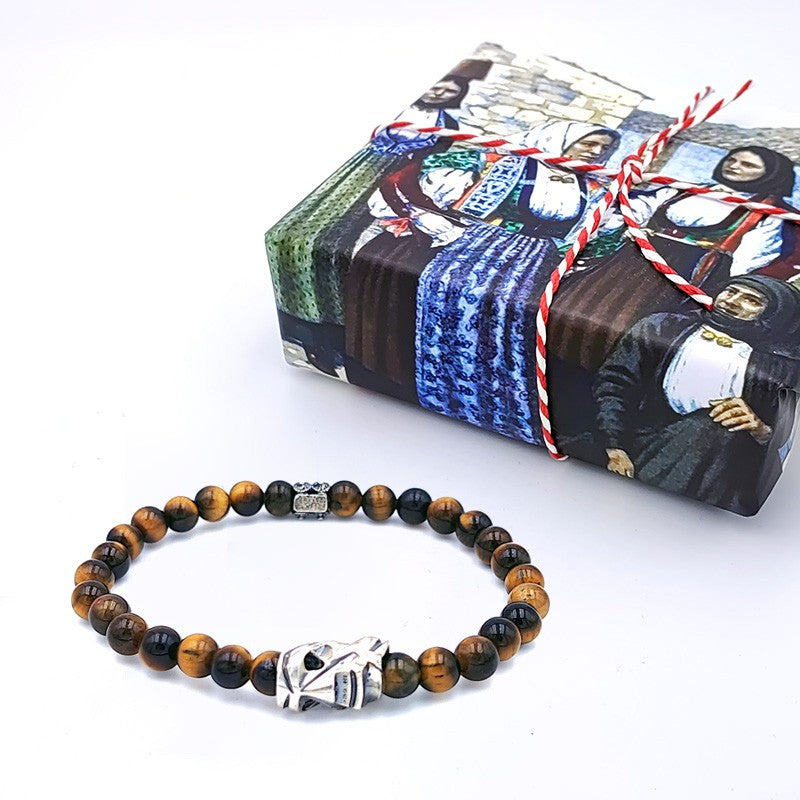 Bracciale elastico con pietra Bronzite e maschera sarda mamuthones in argento