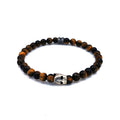 Bracciale elastico con pietra Occhio di Tigre e maschera sarda in argento