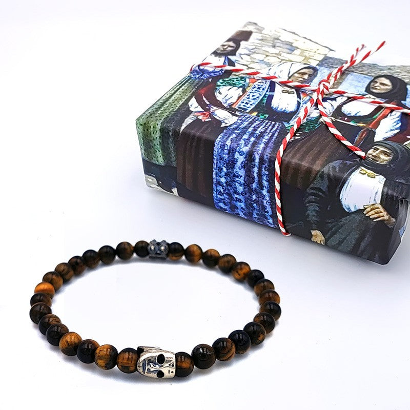 Bracciale elastico con pietra Occhio di Tigre e maschera sarda in argento