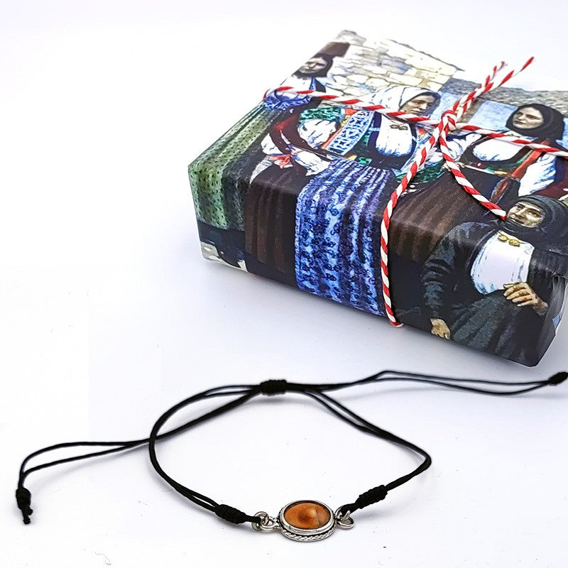 Bracciale in cordino con occhio di Santa Lucia e filigrana d'argento