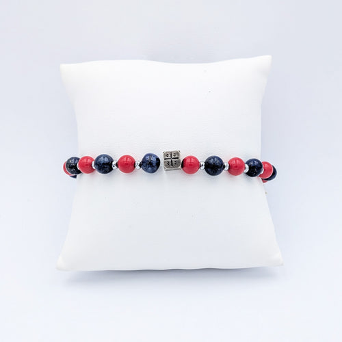 Sardinian silver bracelet with kokkos beads and black beads