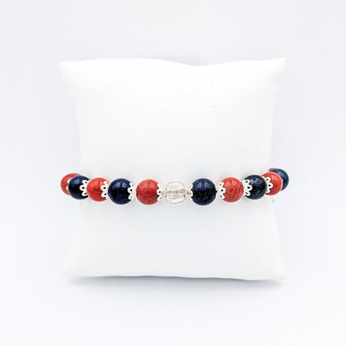 Sardinian silver bracelet with kokkos beads and black beads